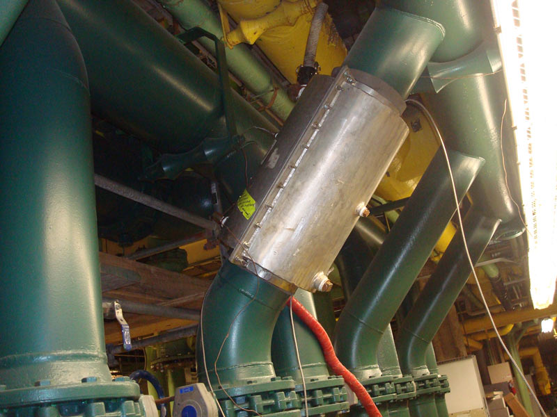 Pipe-freezing jacket fitted around an angled pipe in a plant